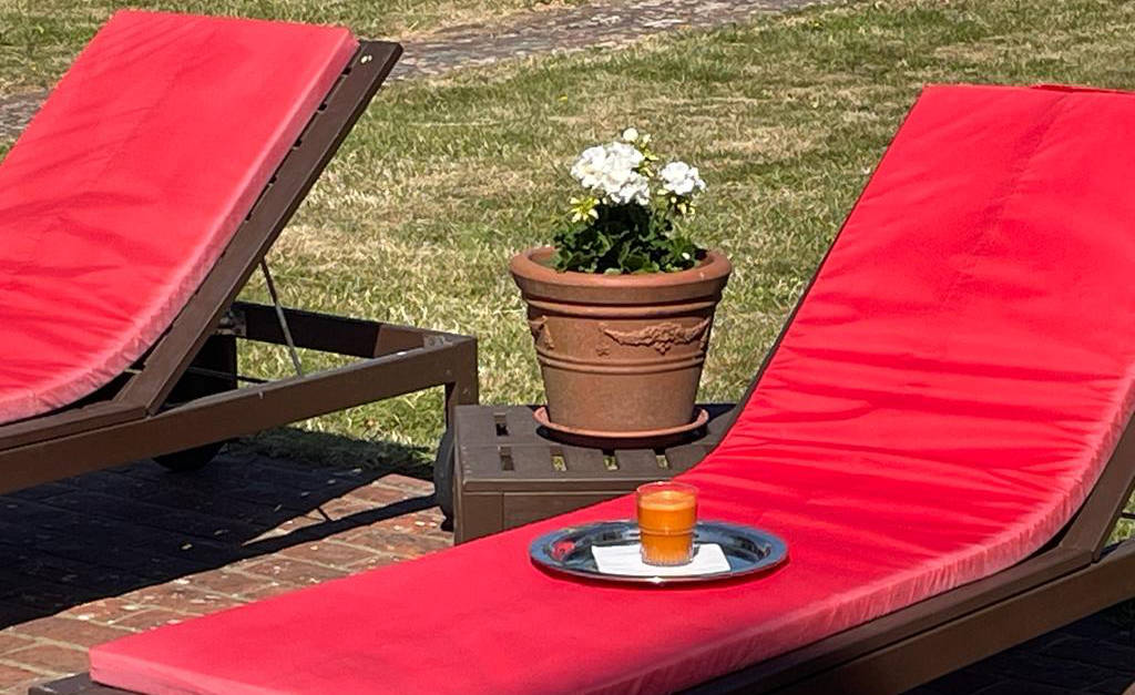 sun loungers by the pool